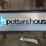 The Potters House sign in final stages of creation