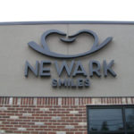 Newark Smiles sign on building of dental office in Newark Ohio