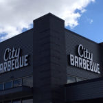 City Barbeque sign on two sides of building