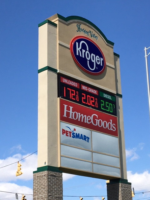 outdoor sign for Kroger Fuel Center and other stores in shopping center